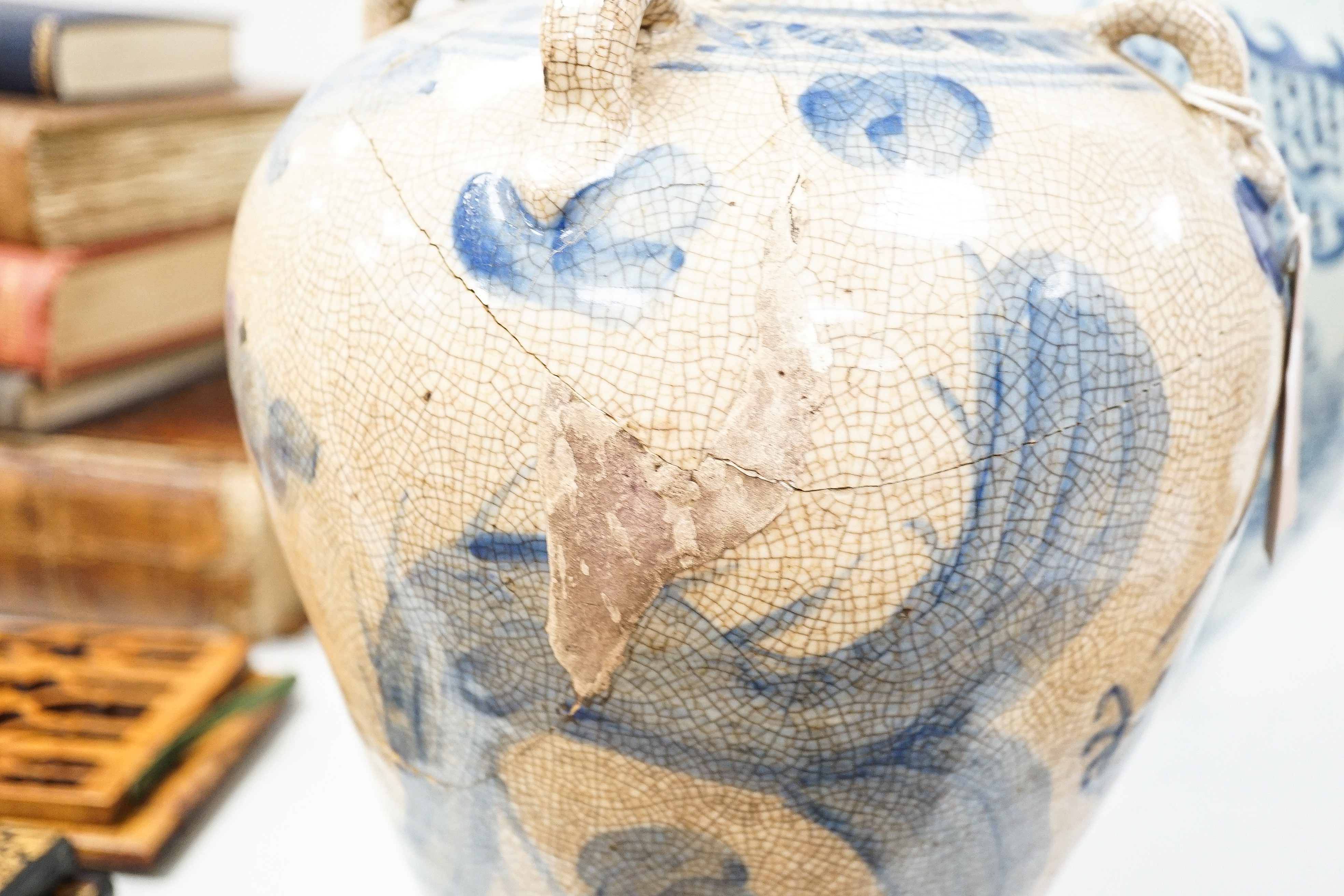A large Chinese blue and white 'dragon' double gourd vase, 64cm high and an Annamesse style blue and white crackle glaze jar